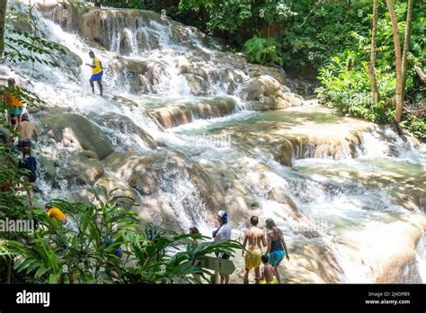 Tourists Climbing Dunns River Falls Ocho Rios St Ann Parish Jamaica