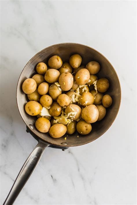 You'll start out by boiling potatoes in heavily salted water until tender. Boiled Baby Potatoes With Garlic Butter And Dill ...