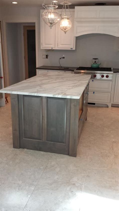 Gel stain dries pretty quickly, so work on one door, drawer or section of cabinet at a time. "classic gray" island. Alder wood | Glazed kitchen cabinets, Gray stained cabinets, Staining ...