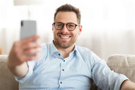 Happy Man Using Smart Phone For Video Call Or Selfie Stock Image