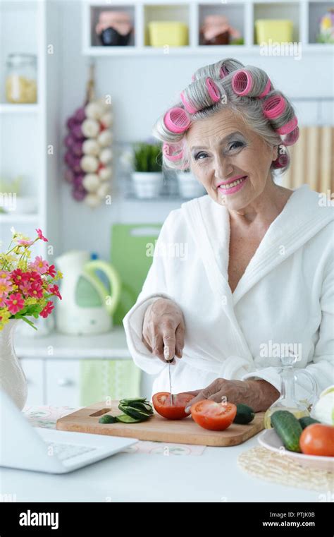 Portrait Of Senior Woman In Hair Rollers Stock Photo Alamy