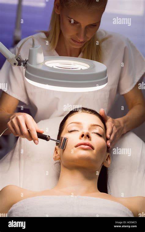 Dermatologist Performing Laser Hair Removal On Patient Stock Photo Alamy