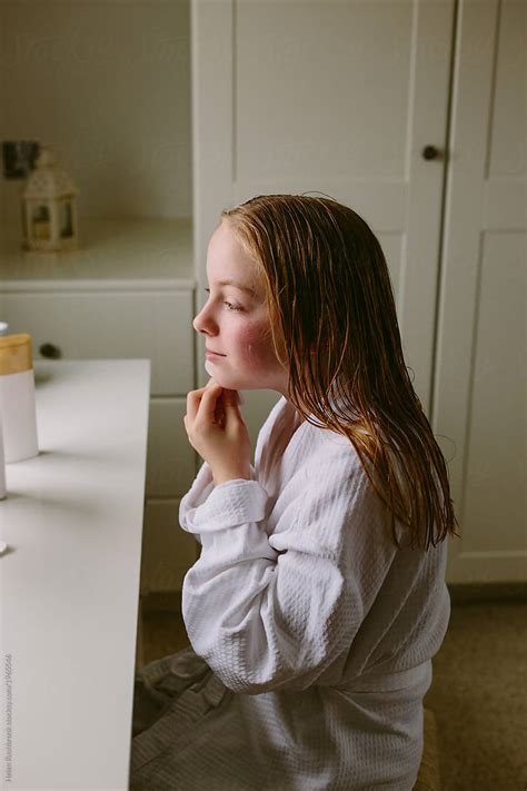 Preteen Girl Looking After Her Skin By Helen Rushbrook