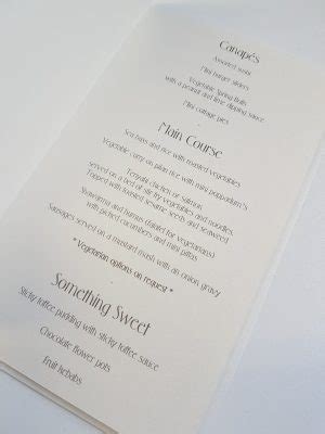 Traditional Ivory Pearlised Wedding Breakfast Menu With Knotted Ribbon