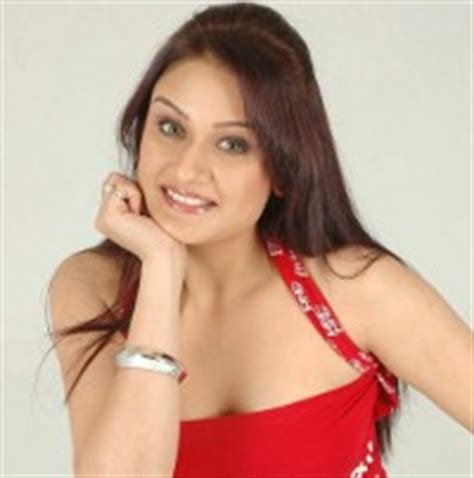 Sonia Agarwal New Hot Photo Shoot Pics Stills In Red Dress