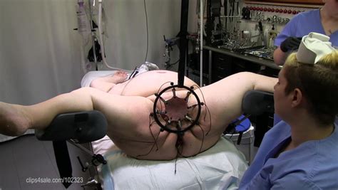With His Scrotum Stretched Flat The Nurses Pierce It With 12 Needles