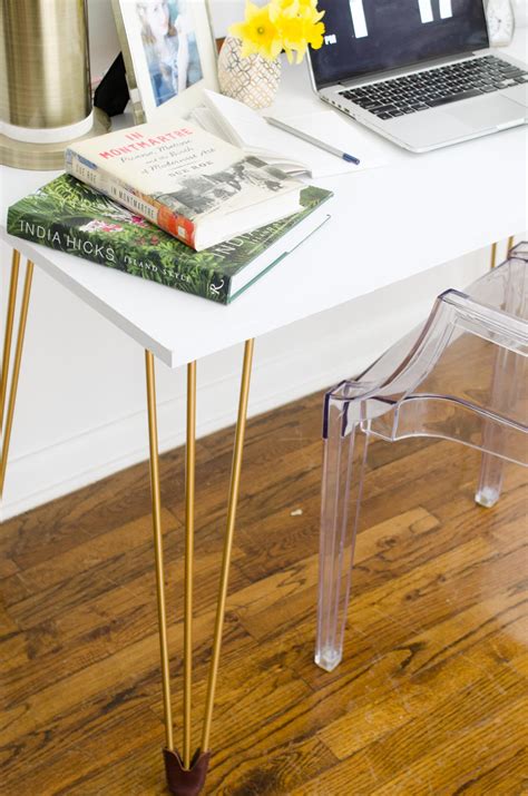 It requires very little materials and you can mount it onto any wall. DIY Desk with Gold Hairpin Legs - Thou Swell