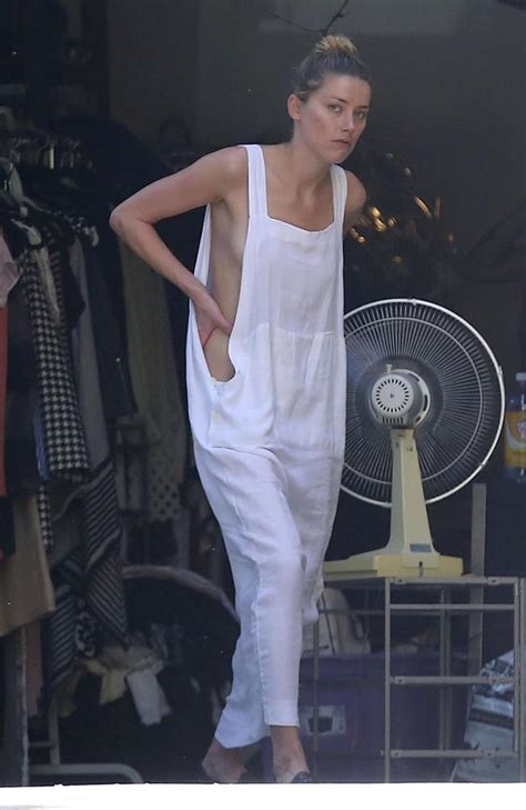 Amber Heard Has Wardrobe Malfunction In Loose Fitting Dress Photos The Advertiser