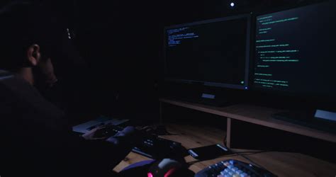 Hacker Sitting In Dark Room In Front Of Stock Footage Sbv 309840238