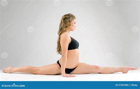Side View Of Blonde Doing Gymnastic Splits Stock Photo Image