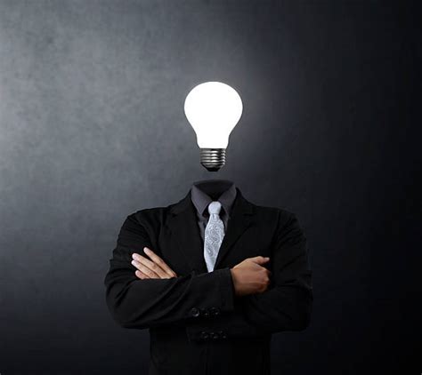 Royalty Free Man Looking Up With Idea Light Bulb Above Head Pictures