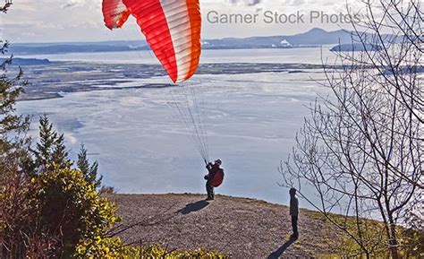 Stock And Fine Art Photos Hang Glider Getting Ready To Jump Off Cliff