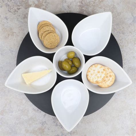 An Unusual Serving Platter Complete With One Dip Bowl And Five