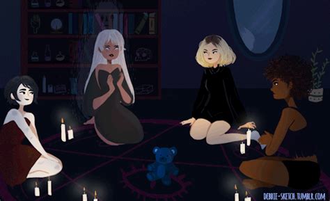 Three Women Sitting On The Floor With Candles In Front Of Them And One