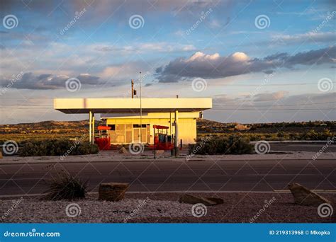 Abandoned Gas Station Sits Empty Along Route 66 At Sunset And Golden