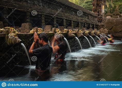 Balinese Hindus Bathing At Tirta Empul Temple In Bali Indonesia