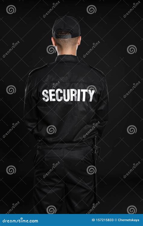 Male Security Guard In Uniform On Dark Stock Image Image Of