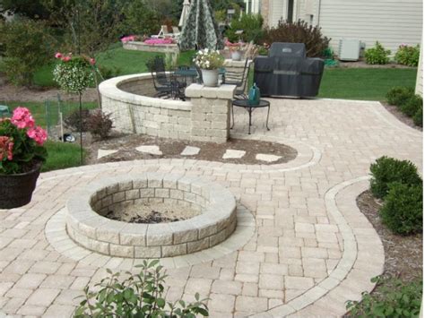 This simple interlocking post and panel system adds architecture and style to your landscape. Outdoor Living Space Design Company: Paver & Block Patios ...