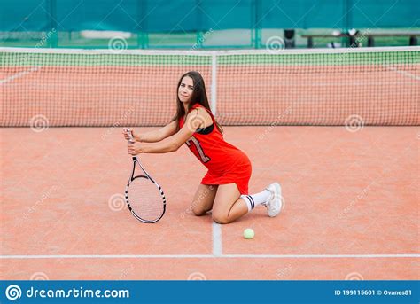 beautiful female tennis player on tennis court red dress stock image image of leisure dress