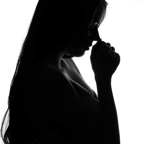 Premium Photo Silhouette Of A Girl In Despair Plea Loneliness Close Up