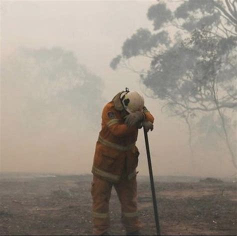 Exhausted Firefighter After Fighting The Australian Bushfires Pics