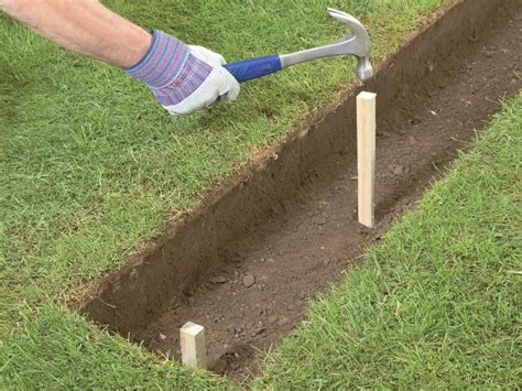 Drive In A Stake At Each End Of The Trench Down To Footing Depth And
