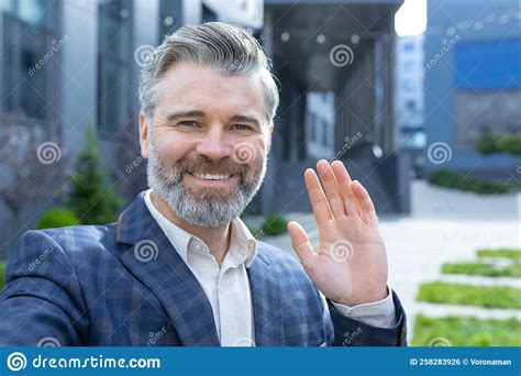 Video Call Of Senior Mature Businessman Gray Haired Man Looking Phone Camera And Smiling