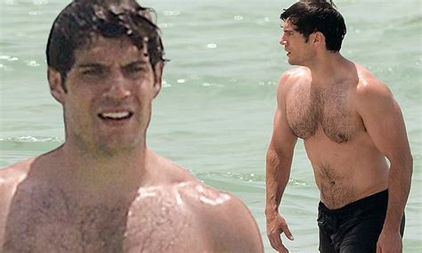 shirtless henry cavill shows off his muscles as he goes for a dip in miami daily mail online