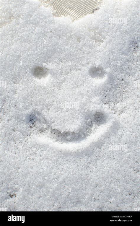 Smiley Face In Snow Winter Sunny Day Snow Background And Texture