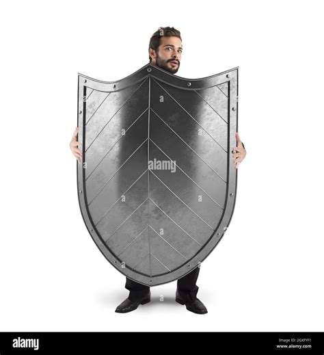 Frightened Man Hiding Behind A Big Shield Stock Photo Alamy