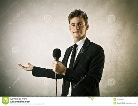 Young Businessman Introducing Someone Stock Image - Image of background ...