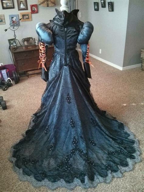 Lace wedding dresses have always been popular among brides. Back of an old wedding dress repurposed in to a witch ...