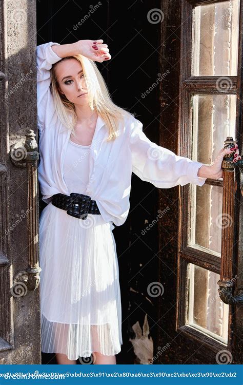 Blonde Woman Stands In The Old Wooden Doorway The Old Wooden Door