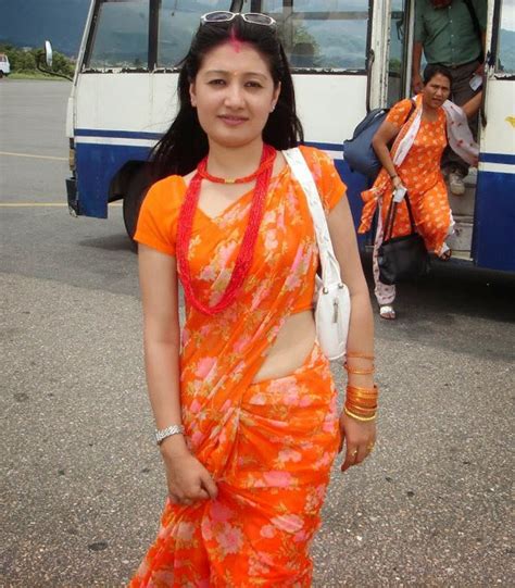 Sexy Slim Hot Nepali Bhabhi In Orange Saree Pics ~ Mirchi Holly Bolly