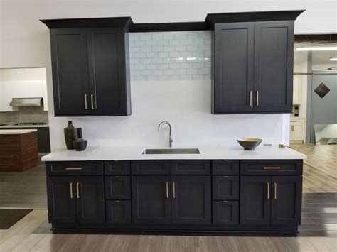 We have value priced kitchen and bath cabinets in stock, custom cabinet finishes and other cabinet options available. Ash Grey Shaker with gold handles | Stock cabinets ...