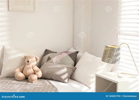 Teddy Bear On Bed In Child Room Interior Design Stock Photo Image Of