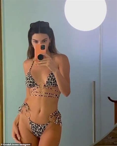 kendall jenner showcases her incredible figure in string bikinis as she shares throwback clips