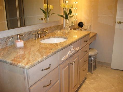 Made from marble dust mixed with resin and can include the plastic laminate: Bathroom vanity with stones top laminate | Home Interiors