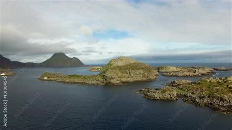 Aerial Footage Of Scenic Small Rocky Islands Near Port Of Mortsund On