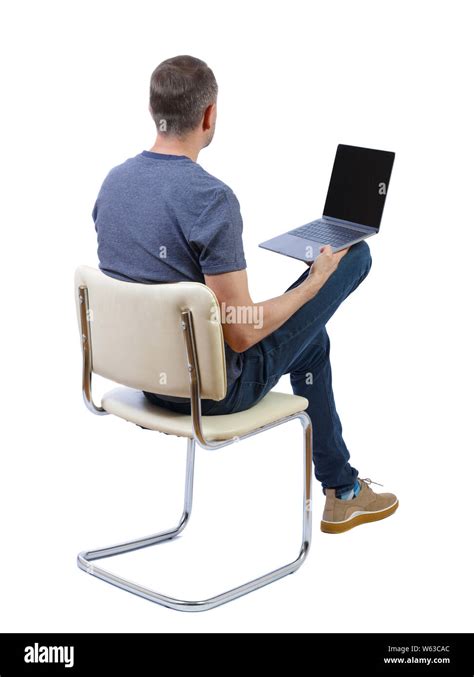 Back View Of A Man Sitting On A Chair Rear View People Collection