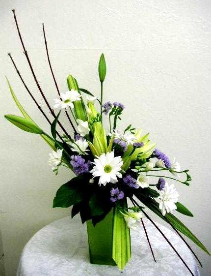 This shape is perfect for home décor and suitable for dining room tables or fireplace mantels. "S" shaped floral arrangement - Ikebana by the Bay
