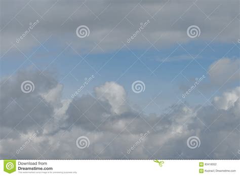 Puffy Clouds Against A Blue Sky Beautiful Stock Photo Image Of