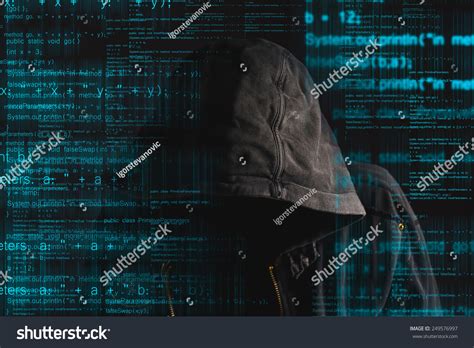 Faceless Hooded Anonymous Computer Hacker Programming Stock Photo