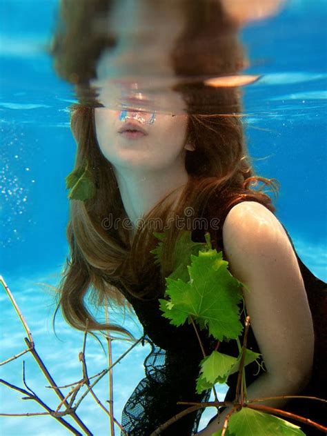 Underwater Fashion Portrait Of Beautiful Blonde Young Woman Stock Image