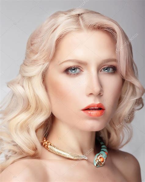 Blonde With Big Blue Eyes Stock Photo By ©gromovataya 104546592