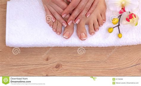 Closeup Photo Of A Beautiful Female Feet With Pedicure Stock Photo