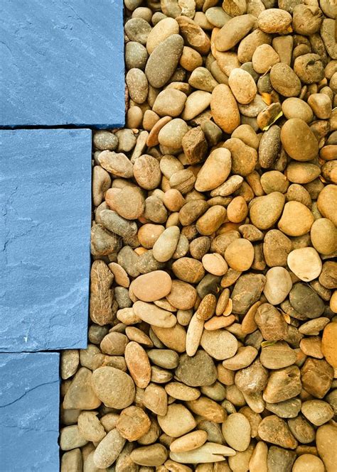 A Lot Of Round Yellow Stones Near The Blue Tiles Stock Image Image
