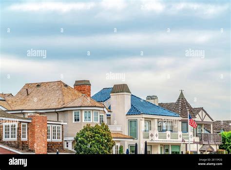 Exterior of houses with elegant designs in coastal neighborhood of Long