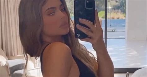 Kylie Jenner Flaunts Peachy Bum As She Strips To Tiny Bra And Skintight