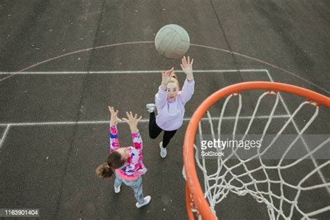 Girls Playing Netball Photos And Premium High Res Pictures Getty Images